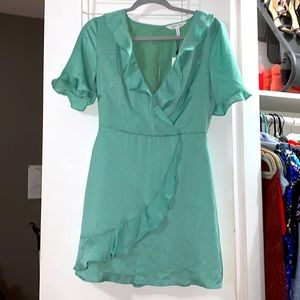 Cute BCBG flowey dress. Pistachio with white polka dots.